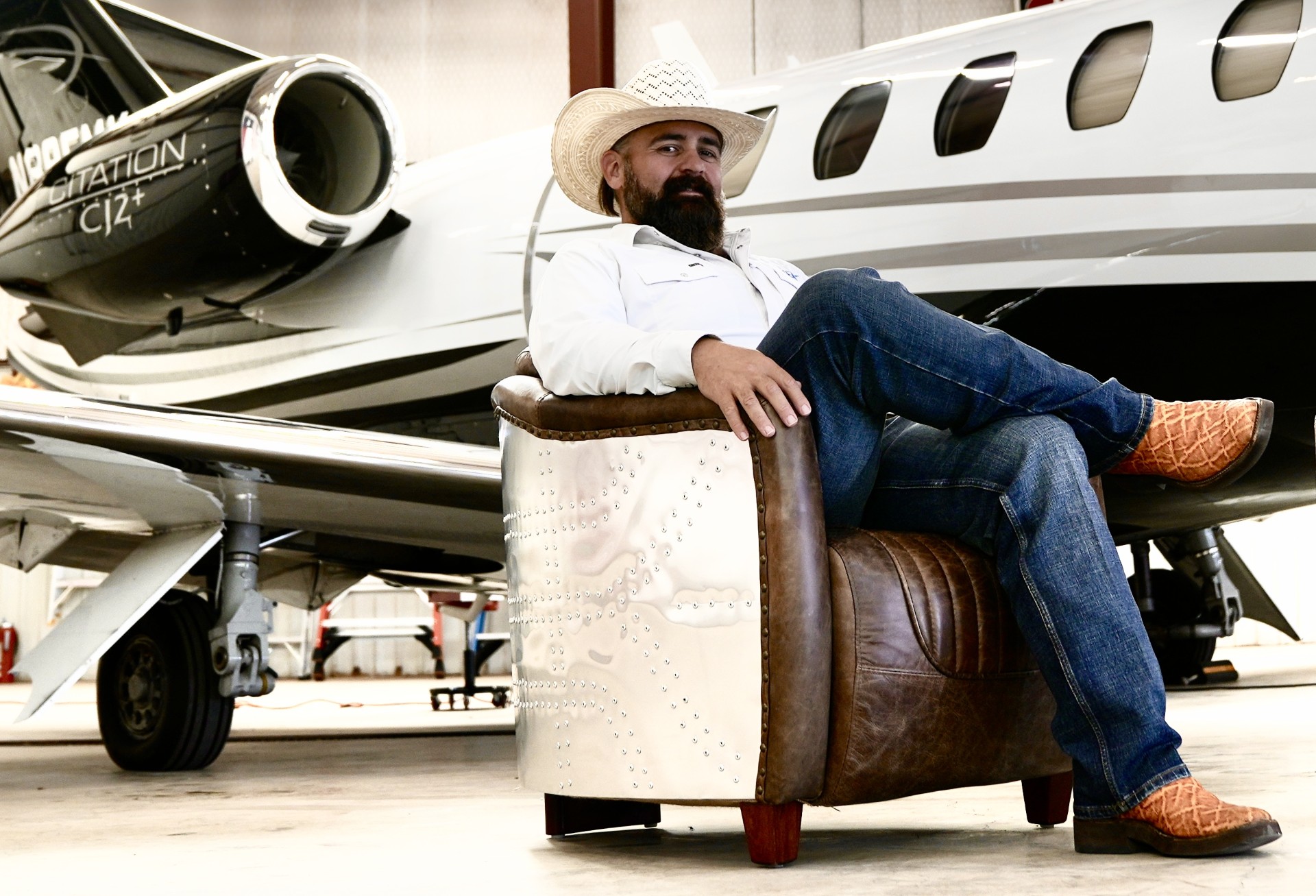 Travis Lamance in front of a Citation CJ2+